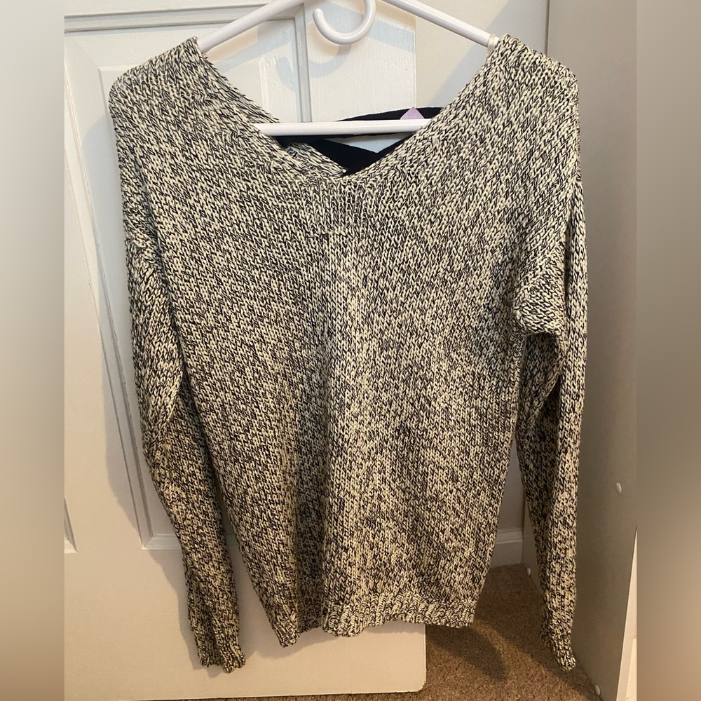 Francesca’s black and white sweater